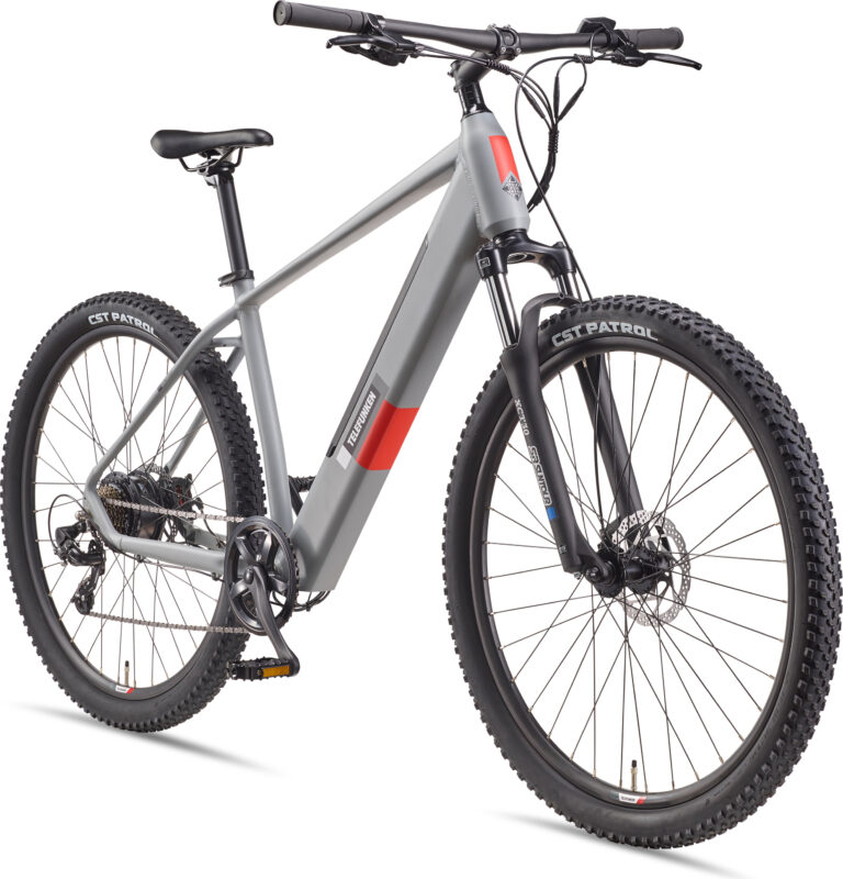 Graues E-Mountainbike mit breiten Reifen und robustem Rahmen auf weißem Hintergrund. Graues E-Mountainbike mit breiten Reifen und robustem Rahmen auf weißem Hintergrund.